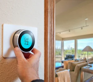 Image of a thermostat installed in an apartment